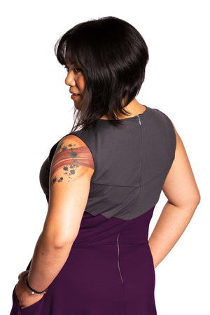 
            
                Load image into Gallery viewer, Close up of Cheryll wearing the Fighter Longsword Dress - Ruby back view. She is wearing a medium. Her measurements are a 40&amp;quot; Bust, 32&amp;quot; Waist, and 40&amp;quot; Hips, and she is 5&amp;#39;4.5&amp;quot;
            
        