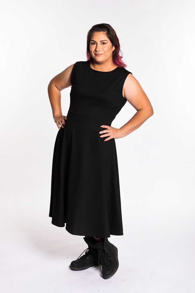 Jessica is wearing the Fighter Longsword Dress - Black. She is wearing an extra large. Her measurements are 47" Bust, 37" Waist, and 46" Hips, and she is 5'6"