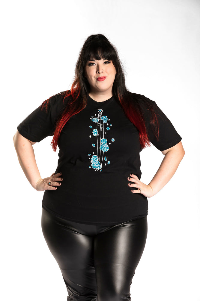 Katie Lynn is wearing the Fighter Floral CLASSic Unisex Tee - Black/Teal in an XL