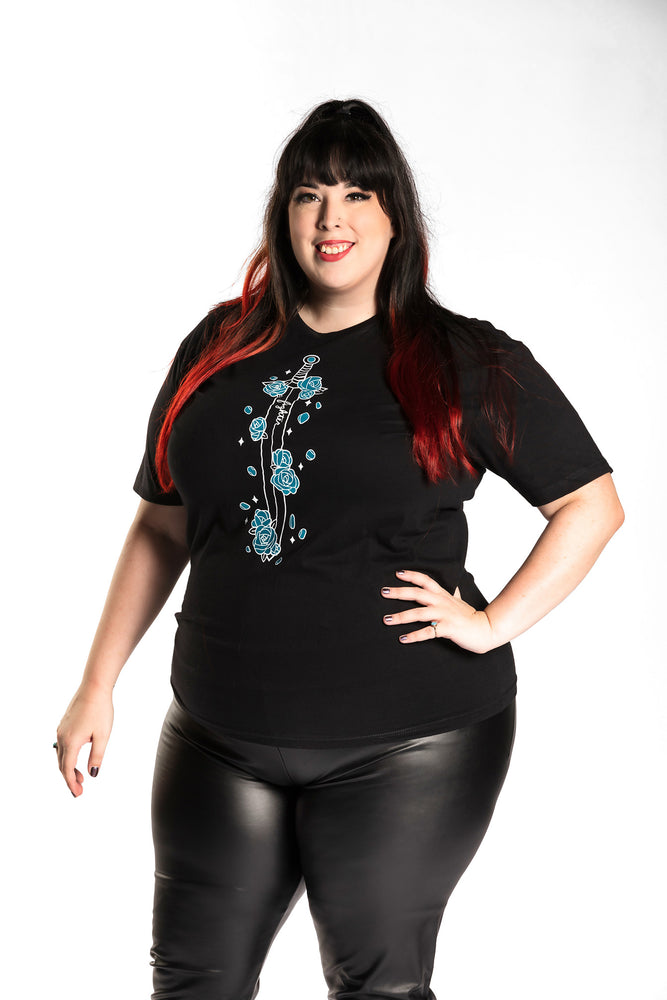 Katie Lynn is wearing the Fighter Floral CLASSic Unisex Tee - Black/Teal in an XL