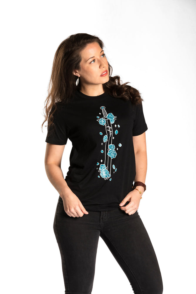 Victoria is wearing the Fighter Floral CLASSic Unisex Tee - Black/Teal in an XS