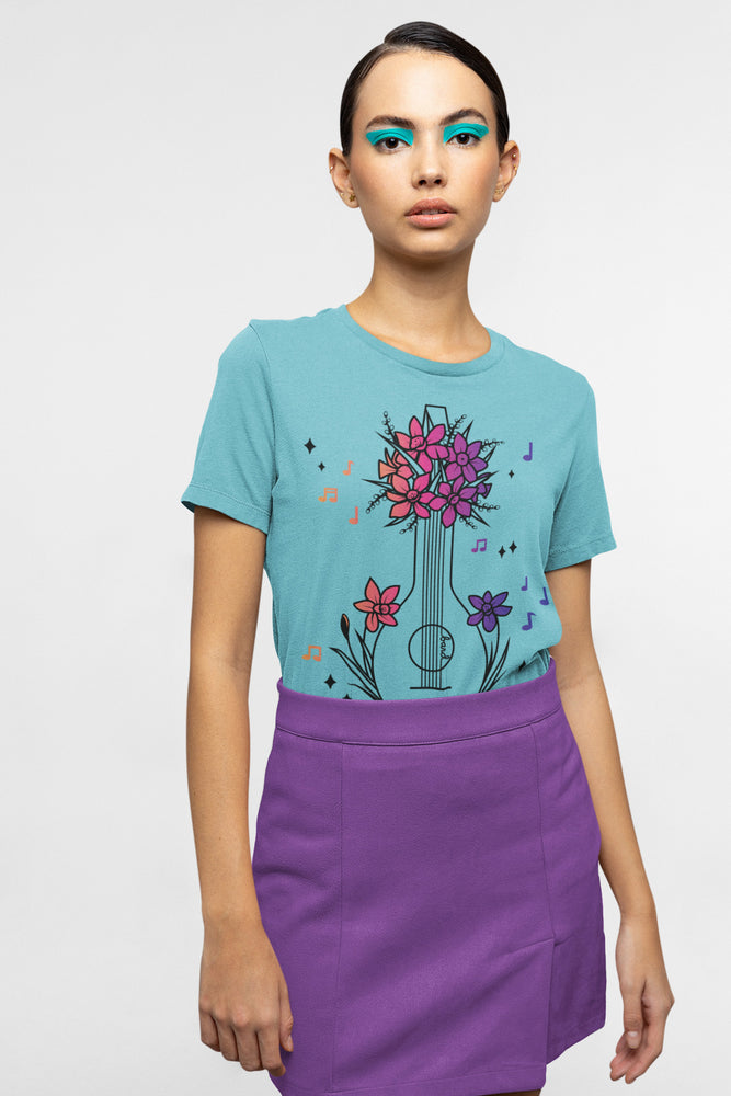 A mock-up of a model wearing the Turquoise Gradient Bard Floral Classic tee.  