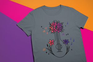 Mock-up of the Gray Gradient Bard Floral Classic Tee. The design features a bouquet of daffodils surrounding a lute.