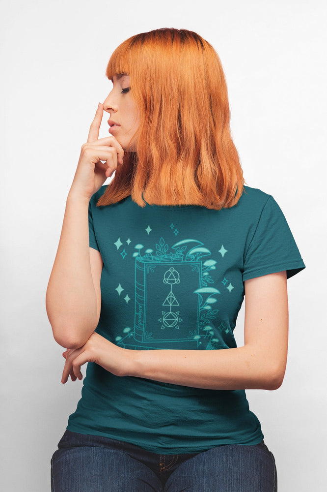 Mockup of model wearing the Wizard Floral CLASSic Unisex Tee - Dark Teal Tone